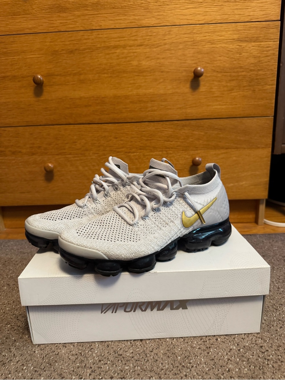 Nike Women’s VaporMax Flyknit Sneaker - Light Gray with Gold Swoosh